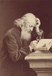 [写本を調べる虫眼鏡を持つひげを生やした男]、1870年代。