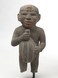 カカオのさやを運ぶ男性、1440-1521年