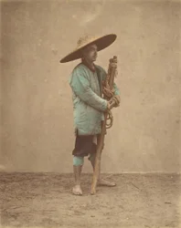 [帽子をかぶった中国人男性]、1870年代。
