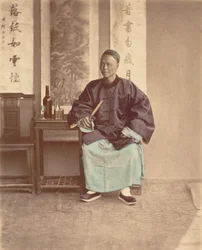 [扇子を持って座る中国人女性]、1870年代。