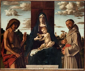 聖フランシスコと洗礼者ヨハネ・パー・モンターニャ、バルトロメオ（1449-1523）との聖母子。 木材に油彩、サイズ : 148x180、1485 年頃、フォンダツィオーネ チーニ、ベネチア