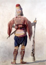 銃を持って立っているトルコの戦士の「A ZEBECK