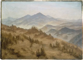 立ちのぼる霧の中の山々