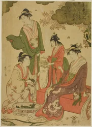 桜を見る女性