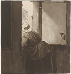 一番下のドアに寄りかかる女性