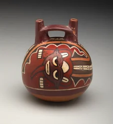 両口のボトル。Deity with Feline Head