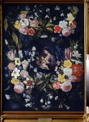 Wreath of Flowers with Madonna and Child (フローラル リース ウィズ マドンナ アンド チャイルド)。 Daniel Seghers (1590-1661) の絵画。 キャンバスに油彩、82 x 64 cm。 フランダース美術、バロック美術。 州立美術館、トゥーラ (またはトラン)。