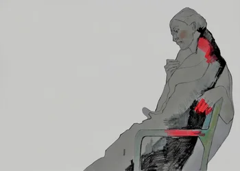 物思いにふける座る女性