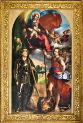 幼児イエスと聖ジョージと聖ミカエルの大天使とマドンナ、1518年頃（パネルに油彩）