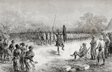 1890年、ウシリでマザンボニの戦士たちの指輪ダンスを見ているヘンリーモートンスタンリー卿（木の彫刻）
