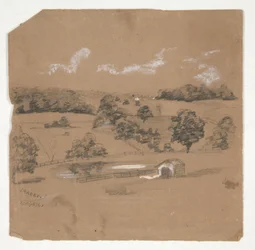 牧草地を見下ろす農場風景
