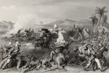 1858年に出版された「インドの反乱の歴史」からの1857年の将軍ニコルソンズの不規則な騎兵隊によるシールコート反逆者への攻撃