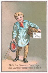 ギフトバスケット、クリスマスカードを提供する少年