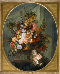 金色の花瓶に入った花・・・。