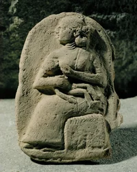 子供をあやす女性...