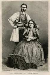 モンテネグロ公爵ニコラス・I・ペトロヴィッチ・ニエゴシュ（1841-1921）とその妻ミレーナ（旧姓ヴーコヴィッチ）（1847-1923）の肖像画、E.Ronjatによるドローイング、1874年にCharles Yriarte（1832-1898）がモンテネグロへの旅を描いたものである。ル・ツアー・デュ・モンテネグロ」に掲載されているエングレーヴィング