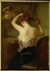 髪を整える女1903