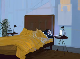 ベッドでノートパソコンを使うミシェルとマンハッタン橋の影