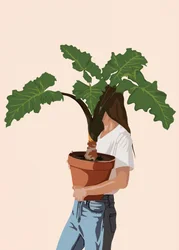 植物を抱える女性