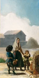 噴水のそばの女性と二人の子供