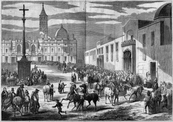 カトリックの祭日-聖アンソニー：1859年1月、イタリア・ローマの聖マリア・マッジョーレ教会（サンタ・マリア・マッジョーレ）の広場で行われた馬の祝福。教会の前には、花崗岩の柱の上に十字架（1595年）が乗っており、ヘンリーの改宗を記念している。