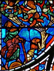 良いサマリア人のたとえを描いた窓からの細部：神は燃える茂みの中でモーセに現れます
