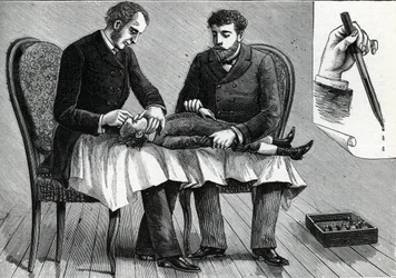 子供の目を診て目薬をさす医師（エングレービング）1888年