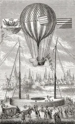 1784年に出版されたフルジェンスマリオンによる「素晴らしいバルーンアセントまたは空の征服」からの1784年6月12日のディジョンからの飛行可能な気球を使った最初の飛行