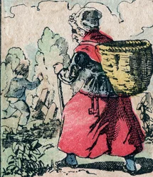 Le Pere Fouettard（フランス語で「鞭打ちの父」の意）は、いたずらっ子を懲らしめる伝説的な民話の人物で、その妻であるLa Mere Fouettardは、学校をさぼっている子供たちを追いかける鞭打ちの母である - Epinalの写真