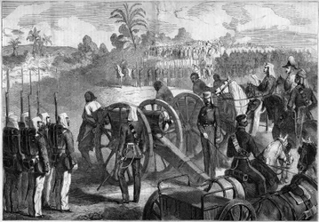 イギリス軍によるインドの反乱の軍事的処刑。囚人は銃口に縛り付けられてから処刑される。インド