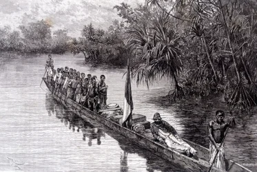 西アフリカのパンダナスでカヌーに乗っているブラザのサヴォルグナン - 1887年第2週の「Tour du Monde」にて