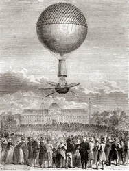 1784年3月2日、ジャン＝ピエール・フランソワ・ブランシャールが、フランス・パリのシャン・ド・マルスから打ち上げた水素ガス気球で、初めて気球飛行に成功した様子を、1870年頃に出版された『Les Merveilles de la Science』からご紹介します（エングレービング）。