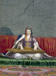 ジェラールスコティン（1671-1716）によって彫刻された、チャールズドフェリオールの「レヴァントのさまざまな国を表す100枚の版画のコレクション」から、キーボードを弾く楽器を演奏するトルコの女の子