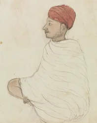 Mies punaisessa turbaanissa