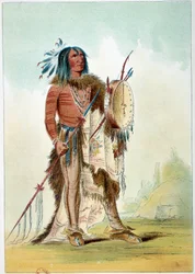 アメリカのインディアン。医者になったインディアンの酋長の肖像は、治療薬が入っているタムタム（tam-tam）を持っている。ジョージ・カトリン（1794-1872）によるイラスト