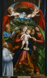 マドンナとチャイルドとセントマーサ、セントジェームス、セントジョセフとドナー、c.1543（パネルに油彩）