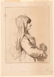 ロザリオを持つ女性