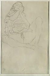 半裸で座り、目を閉じる