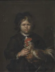 雄鶏を持つ農家の少年