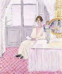 テーブルと花束の前で読書する女性、ナイス