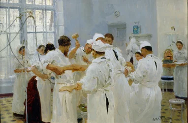手術室の外科医イヴァン・パブロフ (1849-1936) (手術室の外科医パブロフ)。 医療チーム、助手、看護師に囲まれて、外科医は病気の患者を手術します。 Ilya Yefimovich Repin (Ilia Repin) の絵画 (1