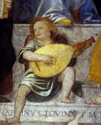 リュートを弾く天使の音楽家。17世紀にミラノの教会で描かれたフレスコ画の詳細。