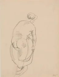 後ろから見た裸の女性の立ち姿