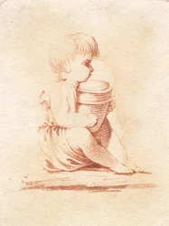 座っている小さな男の子