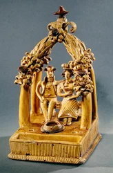 アーバンの下に座っている夫婦とのライティングセット、ボーンワークショップ（セラミック）
