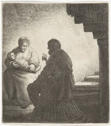 らせん階段のそばに座る家族