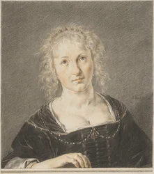欄干のそばの若い女性