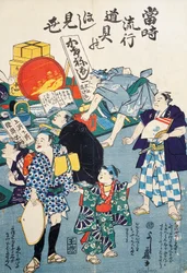 箱、扇子、本、かけものを売る屋台