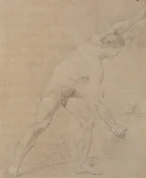 モデルは立って右を向き、左腕を上げ、右腕を下げ、岩にもたれかかっています。