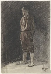 ヘルメットをかぶり、本の脚を丸めた立っている男性